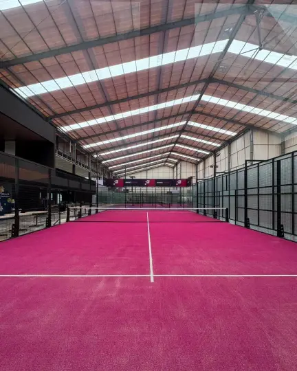 A hot-pink court with white lines