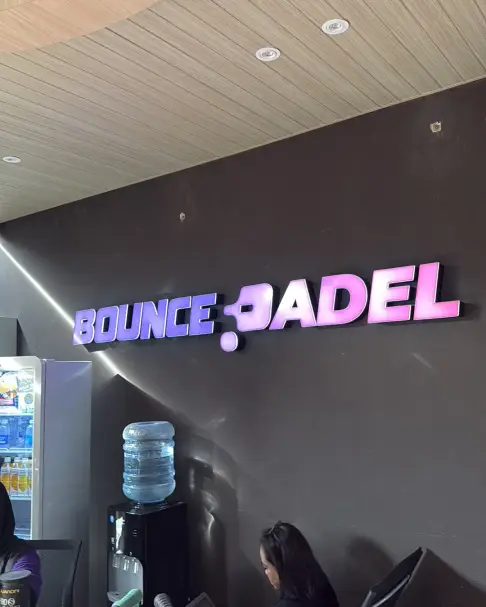 Lit Bounce Padel sign at reception
